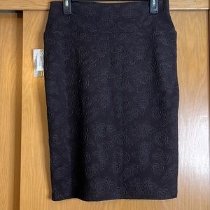 Lularoe black elegant cassie skirt with rose pattern, size medium